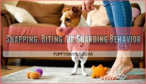 snapping, biting, or guarding behavior